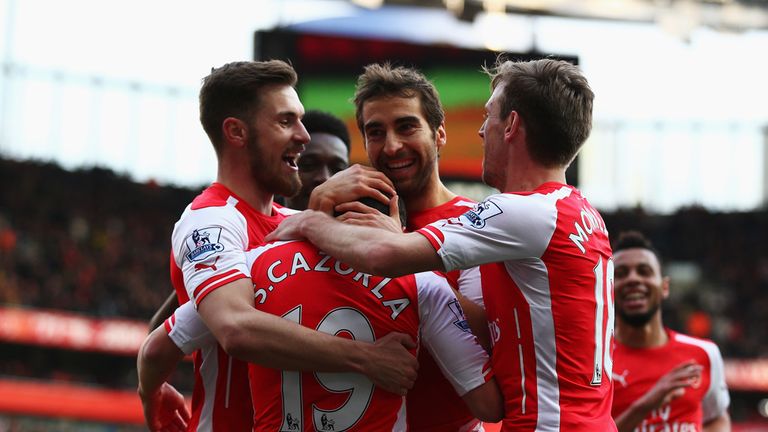 Mathieu Flamini of Arsenal celebrates scoring his team's third goal against West Ham