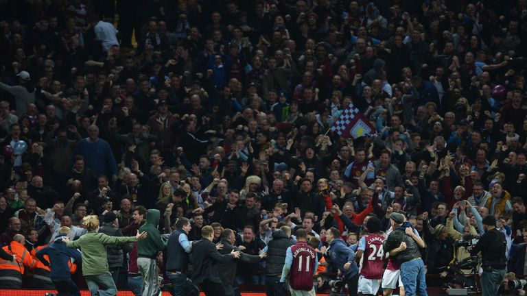 Fans and players celebrate at Villa Park
