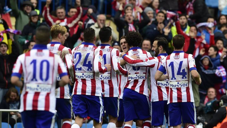Atletico Madrid players celebrate after scoring a goal  during the Spanish league football match Club Atletico de Madrid vs Getafe at the Vicente Calderon
