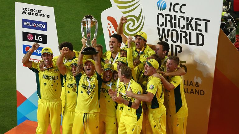 Australia celebrate with the trophy after they defeated New Zealand during the 2015 ICC Cricket World Cup final at Melbourne Cricket Ground