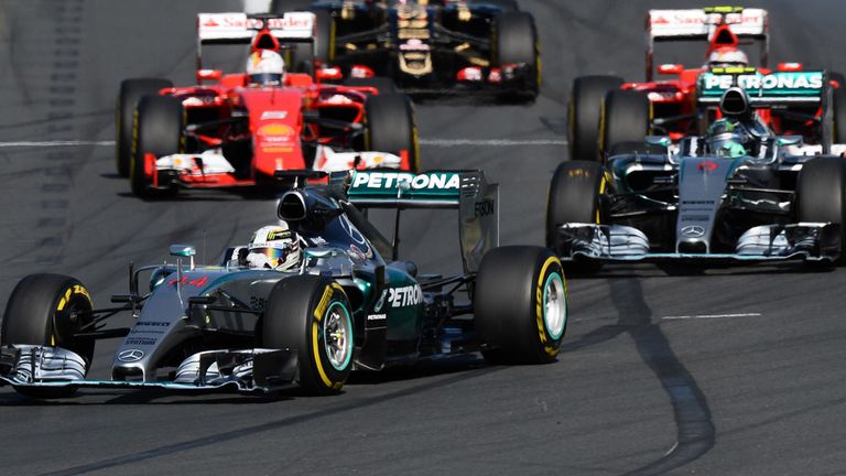 Lewis Hamilton (GBR) Mercedes AMG F1 W06 leads 
