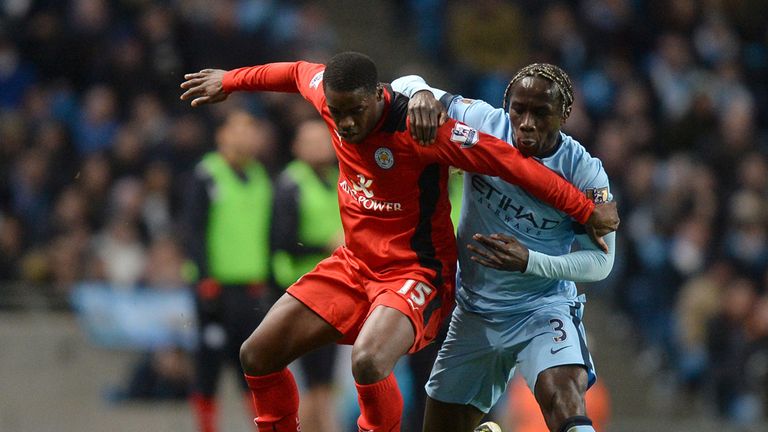 Bacary Sagna puts Jefferey Schlupp under pressure