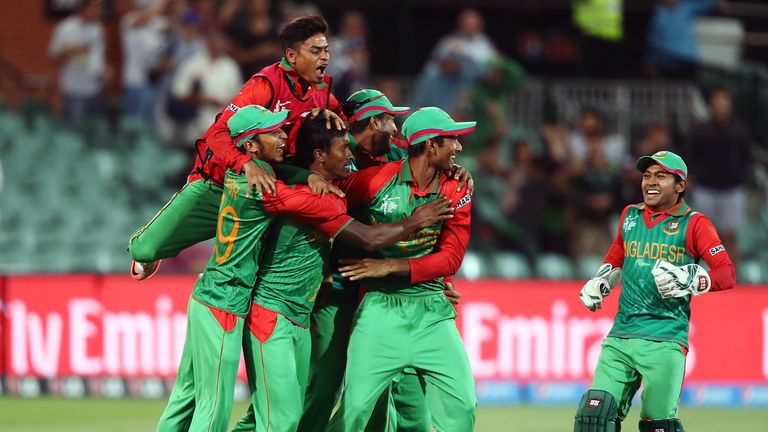 ADELAIDE, AUSTRALIA - MARCH 09: Bangladesh players celebrate after winning the 2015 ICC Cricket World Cup match between England and Bangladesh at Adelaide 