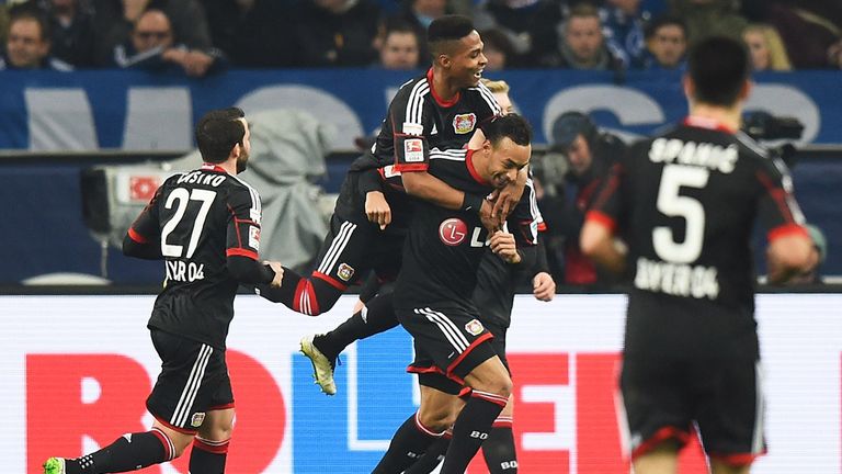 Karim Bellarbi of Bayer 04 Leverkusen is congratulated after scoring