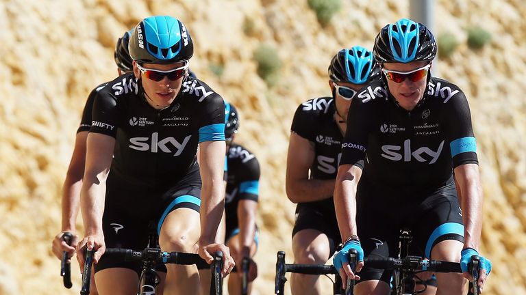 Chris Froome of Great Britain and Team SKY chats to team mate Ben Swift during a training ride ahead of the 2014 Tour 