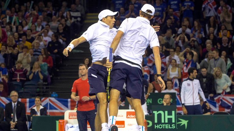 Mike (l) and Bob Bryan celebrate during their Davis Cup doubles win in GB v USA