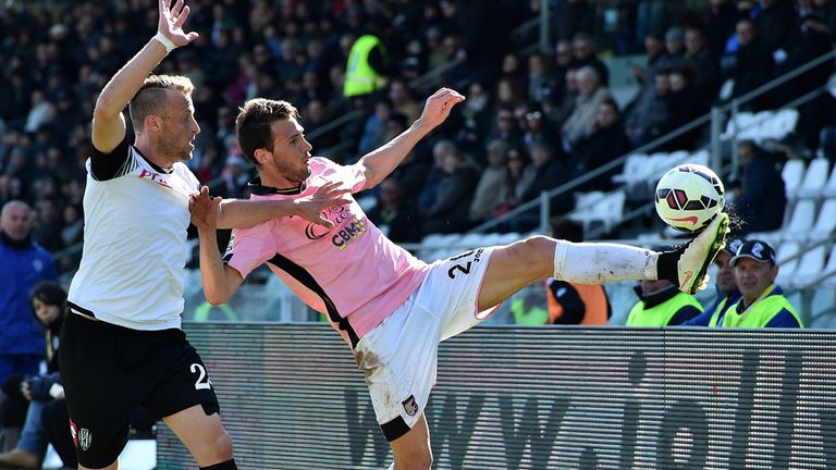 Franco Vazquez and Gabriele Perico compete for the ball 