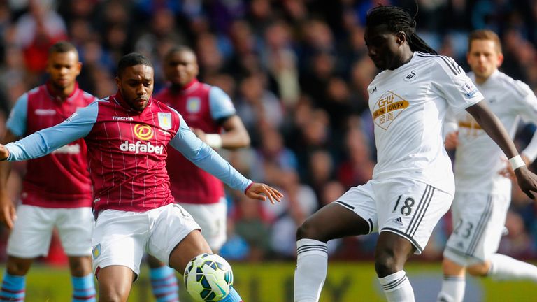 Charles N'Zogbia of Aston Villa and Bafetibis Gomis of Swansea in action