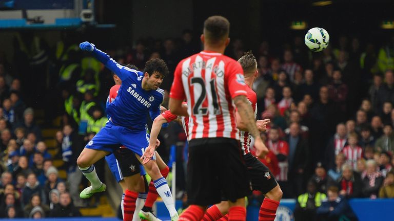 Diego Costa of Chelsea heads in the opening goal during the Barclays Premier League match between Chelsea and Southampton
