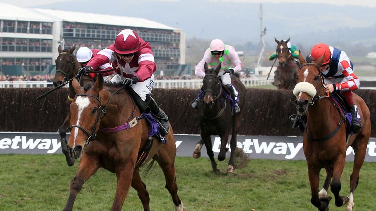 Don Poli ridden by Bryan Cooper (left) races clear of the field before going on to win in the RSA Chase on Ladies Day during the Cheltenham Festival at Che