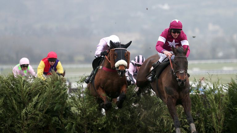 Rivage D'Or ridden by Davy Russell (right) jumps clear and goes on to win the Glenfarclas Handicap Chase