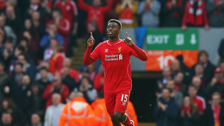 Daniel Sturridge celebrates after making it 1-2.