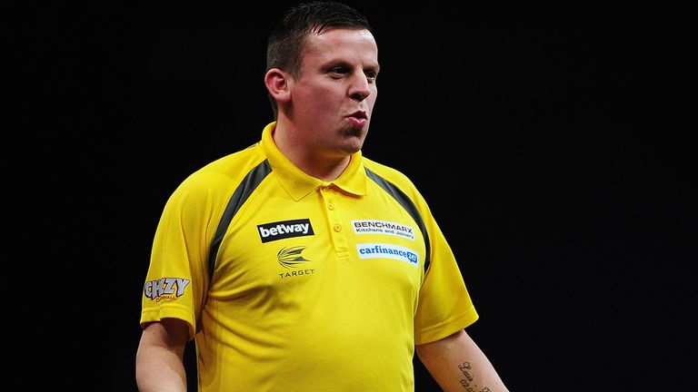 EXETER, ENGLAND - MARCH 05:  Dave Chisnall of England celebrates his victory over Gary Anderson of Scotland during The Betway Premier League Darts at Westp
