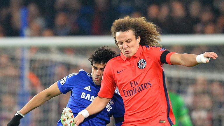Paris Saint-Germain's David Luiz (R) in action against Chelsea's Diego Costa