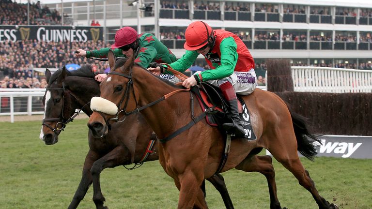 Dodging Bullets ridden by Sam Twiston-Davies (right) races clear of second placed Somersby ridden by Brian Hughes and goes on to win the Betway Queen Mothe