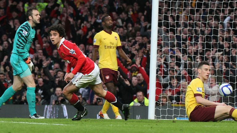 Fabio Da Silva of Manchester United celebrates scoring their first goal during the FA Cup quarter final against Arsenal at Old Trafford in March 2011