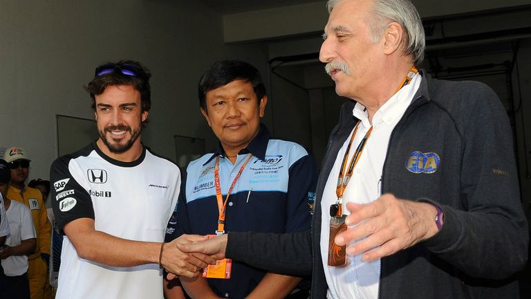 Fernando Alonso gets the all-clear from doctors at Sepang
