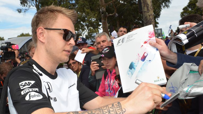 Kevin Magnussen signs autographs for the fans in Melbourne