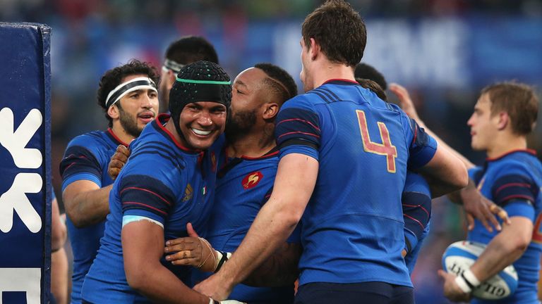 ROME, ITALY - MARCH 15:  Thierry Dusatoir, (L) the France captain congratulates team mate Mathieu Bastareaud after his try during the Six Nations match bet