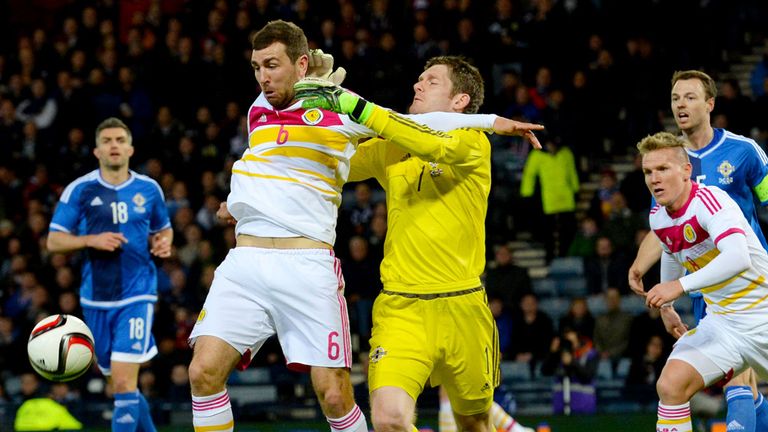 Scotland's James McArthur (left) and Northern Ireland's Michael McGovern battle in the box