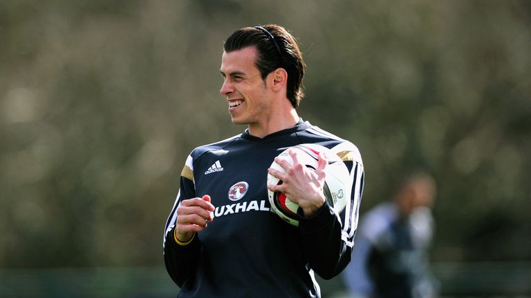 Wales player Gareth Bale raises a smile during training ahead of this weekend's game against Israel at the Vale Hotel on March 25, 2015 in Cardiff