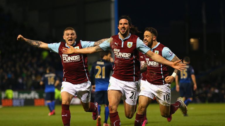 BURNLEY, ENGLAND - MARCH 14:  George Boyd of Burnley (C) celebrates scoring the opening goal  during the Barclays Premier League match between Burnley and 