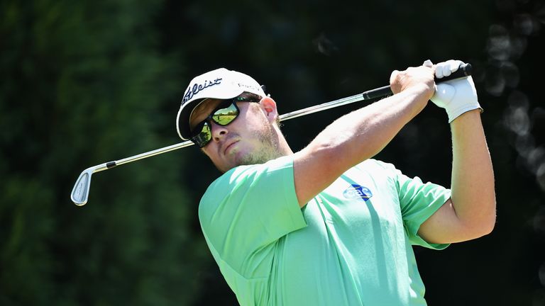 George Coetzee of South Africa plays a shot during the final round of the Tshwane Open at Pretoria Country Club.