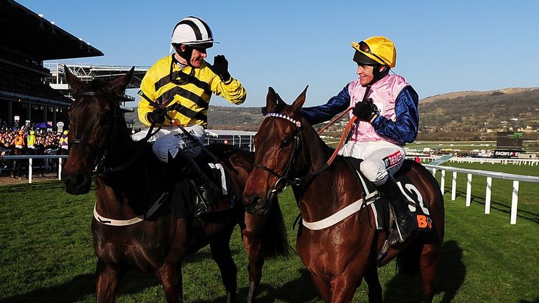 Paul Townend celebrates on board Glens Melody (L) alongside second placed Polly Peachum ridden by Barry Geraghty