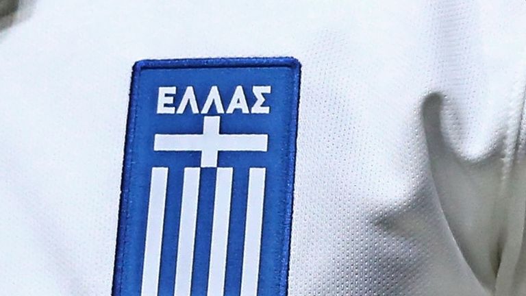 A picture shows a partial view of the new jersey of the Greek football team will be worn during the 2014 World Cup in Brazil. AFP PHOTO / STR        (Photo