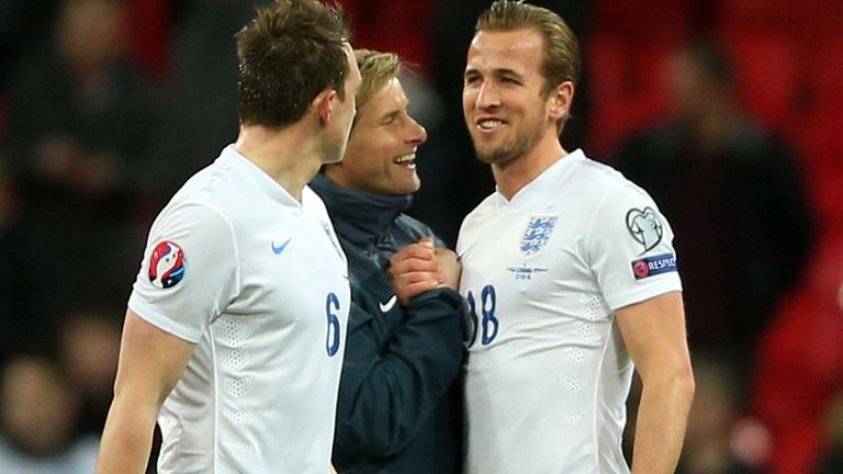 A smiling Harry Kane, with Phil Jones (6) and Dave Watson  following Friday's match at Wembley