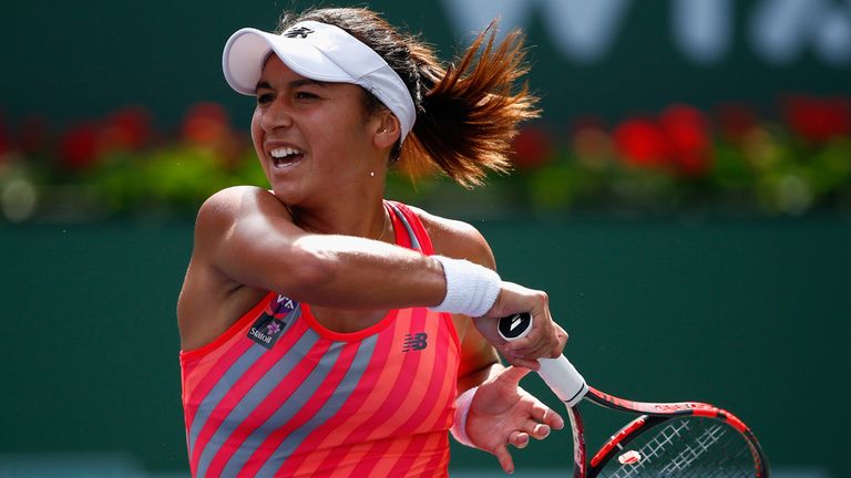 INDIAN WELLS, CA - MARCH 15:  Heather Watson of Great Britain in action against Agnieszka Radwanska of Poland during day seven of the BNP Paribas Open tenn