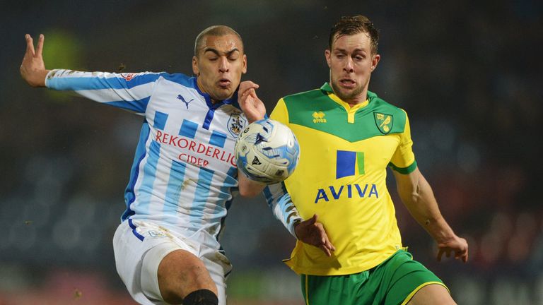 James Vaughan and Steven Whittaker battle for the ball 