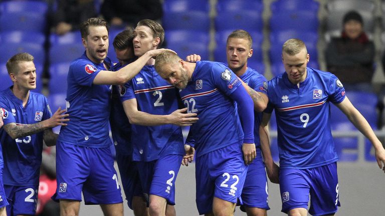 Iceland's players celebrate after scoring 