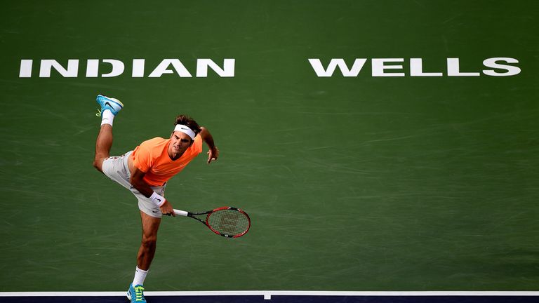 Roger Federer of Switzerland serves in his match against Diego Schwartzman of Argentina during the BNP Parisbas Open 
