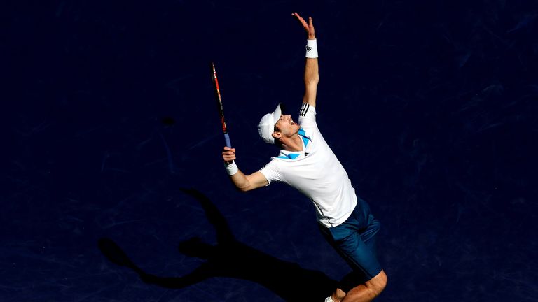 Andy Murray of Great Britain serves to Milos Roanic of Canada during the at  Indian Wells 