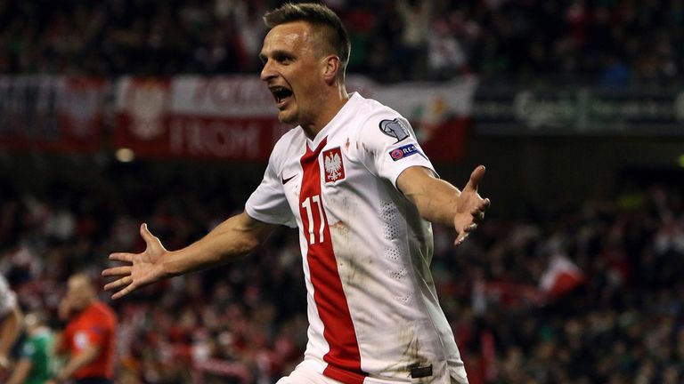 Poland's midfielder Slawomir Peszko celebrates after scoring against Republic of Ireland