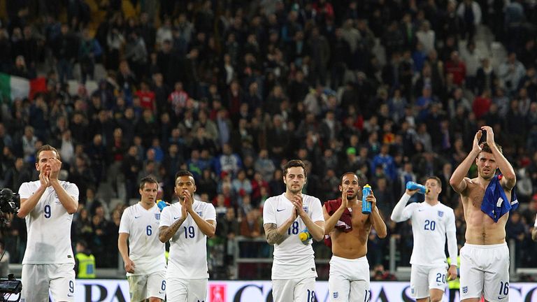 The England players salute the fans at the end of the international friendly against Italy