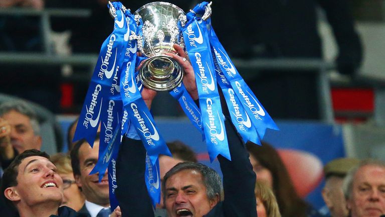Jose Mourinho lifts the Capital One Cup 