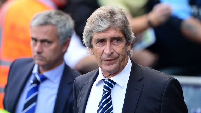 Jose Mourinho (out of focus), Manuel Pellegrini, Manchester City v Chelsea, September 2014