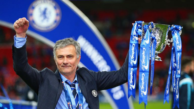 Jose Mourinho of Chelsea poses with the trophy during the Capital One Cup Final