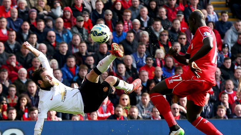 Juan Mata of Manchester United scores