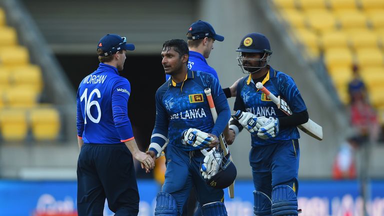Kumar Sangakkara of Sri Lanka shakes hands with England captain Eoin Morgan at the end of the 2015 ICC Cricket World Cup match