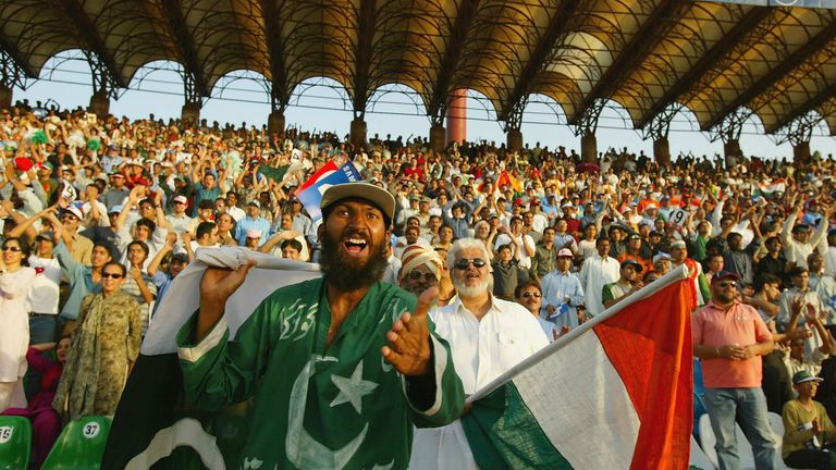 LAHORE, PAKISTAN - MARCH 24 :  Pakistan and India supporters watch the match in the stands during the fifth Pakistan v India one-day international match pl