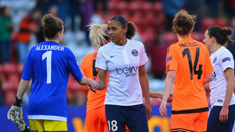 Lee Alexander shakes hands with Marie-Laurie Delie following the final whistle in Glasgow