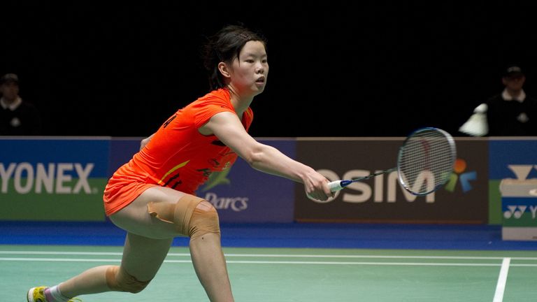 Li Xuerui of China returns the shuttlecock to Tai Tzu Ying of Taiwan on March 10, 2012 during the women's singles semi-finals match at the All-England Open