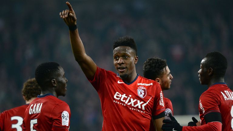 Lille's Belgian forward Divock Origi (C) celebrates after scoring a goal during the French L1 football match between Lille (LOSC) and Rennes (SRFC).