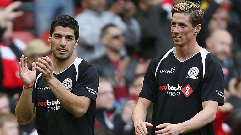 Luis Suarez (left) and Fernando Torres after the Liverpool All Stars Charity match at Anfield, Liverpool.