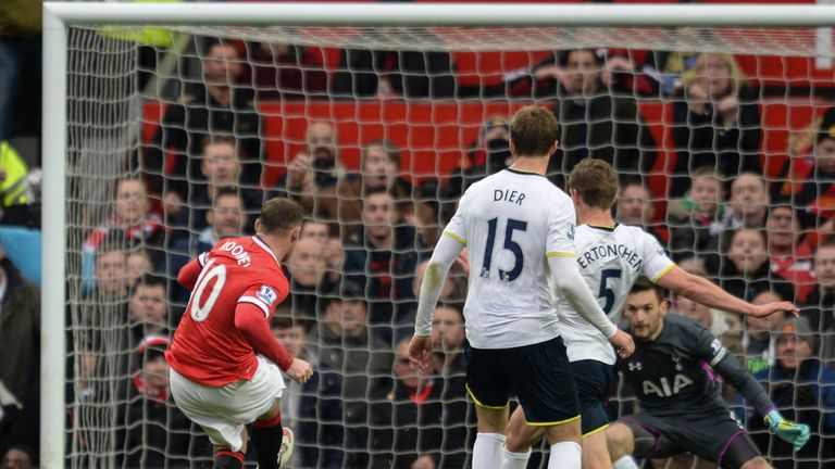 Manchester United's Wayne Rooney scores their third goal against Tottenham Hotspur during the Barclays Premier League match at Old Trafford, Manchester.
