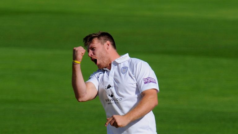 Hampshire bowler Matt Coles celebrates after taking the wicket of Glamorgan batsman William Bragg