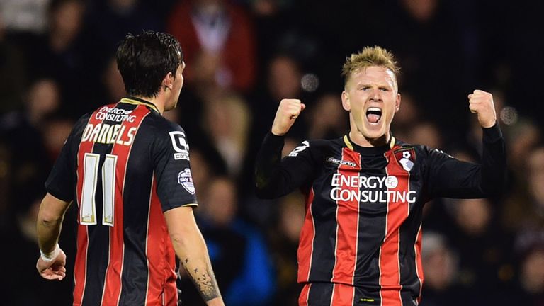 LONDON, ENGLAND - MARCH 06:  Matt Ritchie of Bournemouth (30) celebrates with team mate Charlie Daniels as he scores their second goal during the Sky Bet C